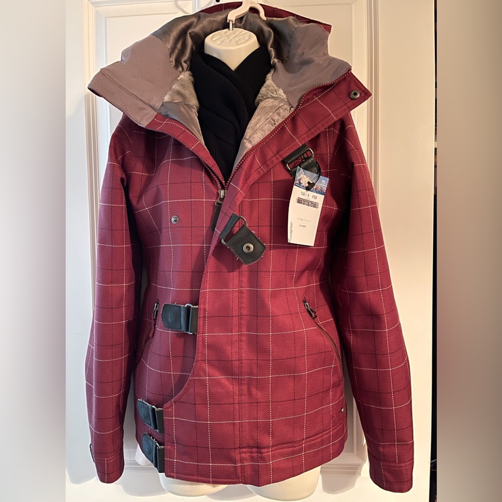 Burton Women’s snowboarding jacket with red stripes very warm